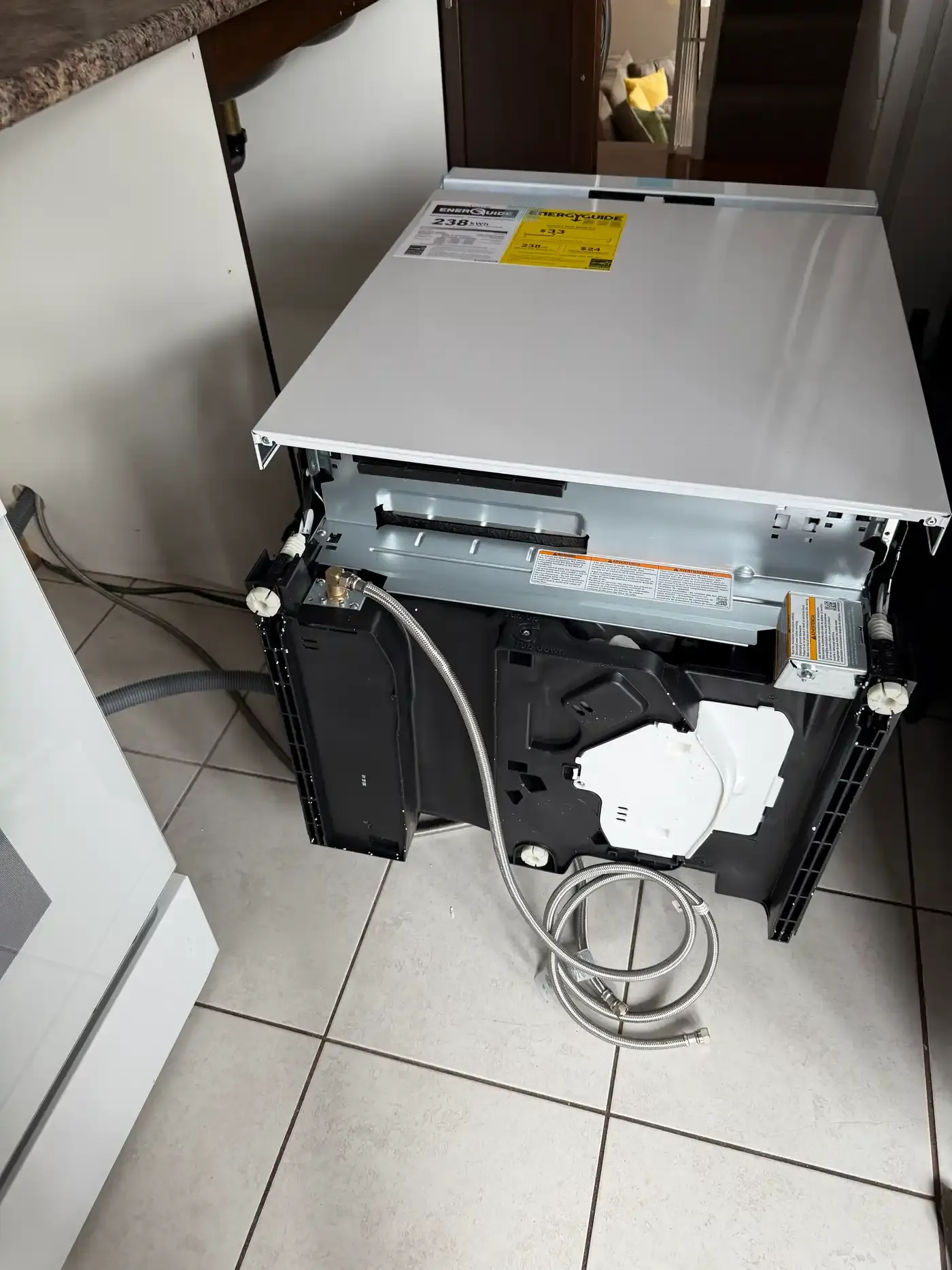 Dishwasher water line connection during install in Ottawa