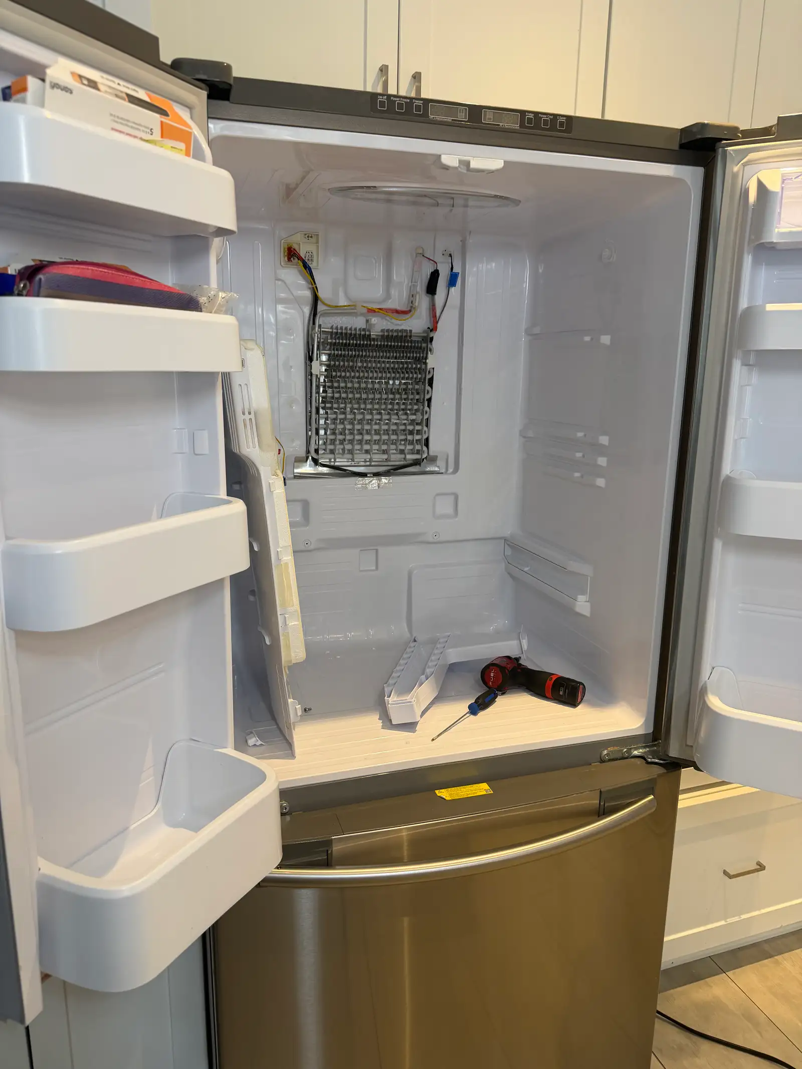Evaporator coil inspection during fridge repair