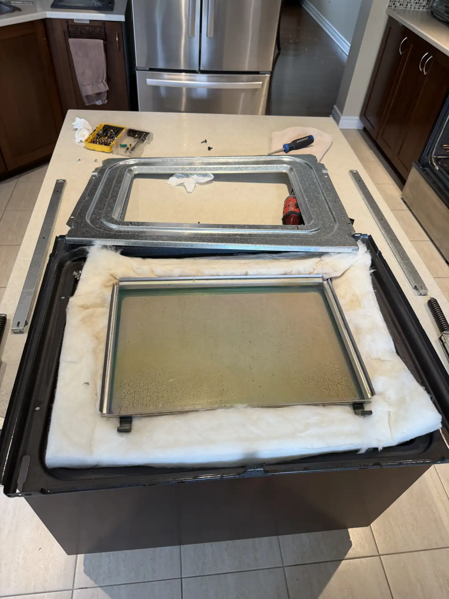 Oven door disassembled for inner glass replacement in Ottawa