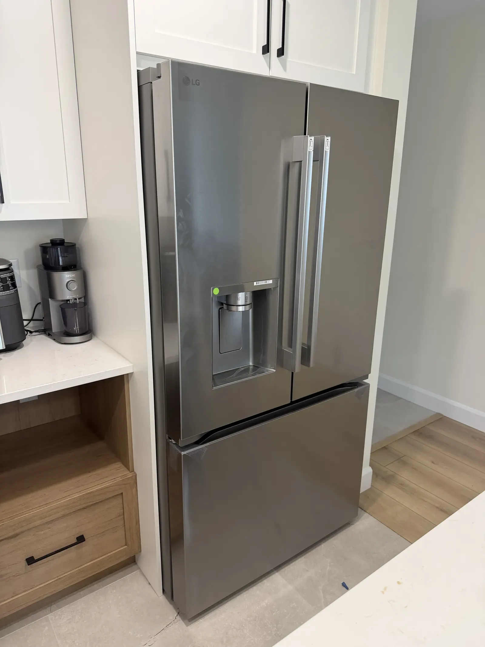 Refrigerator installation in a modern Ottawa kitchen