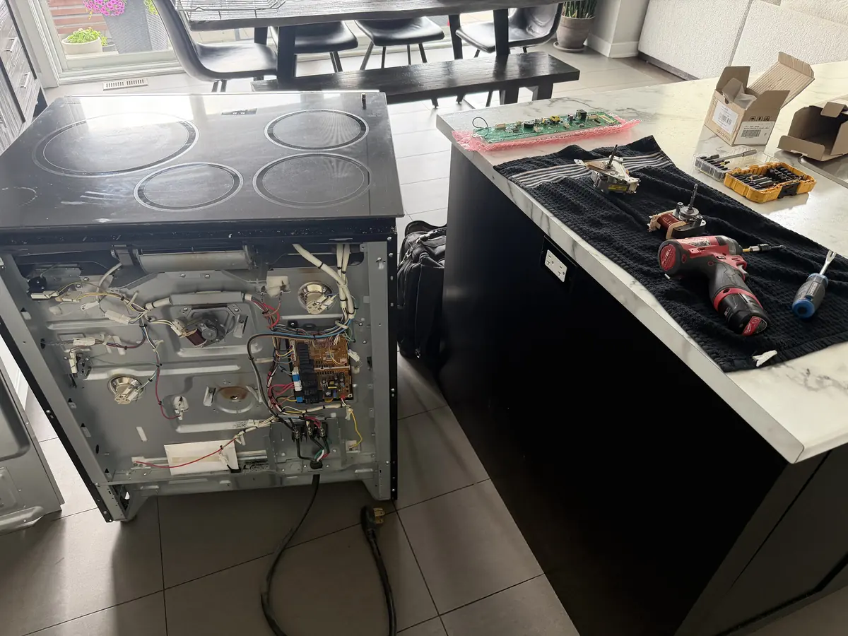 Electric range pulled out for control board replacement in Ottawa