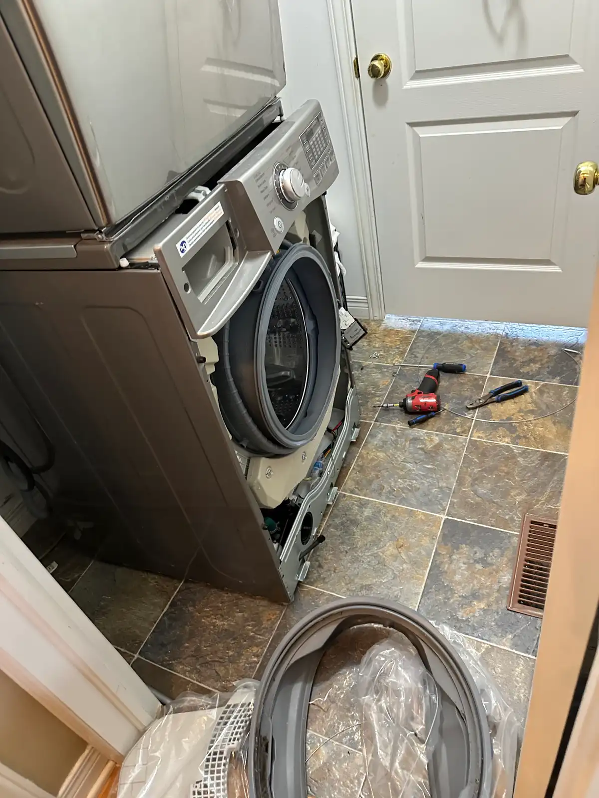 Washer door seal removed during repair in Ottawa